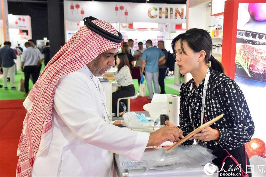 參展商交流。人民網(wǎng)塔里克·易卜拉欣攝