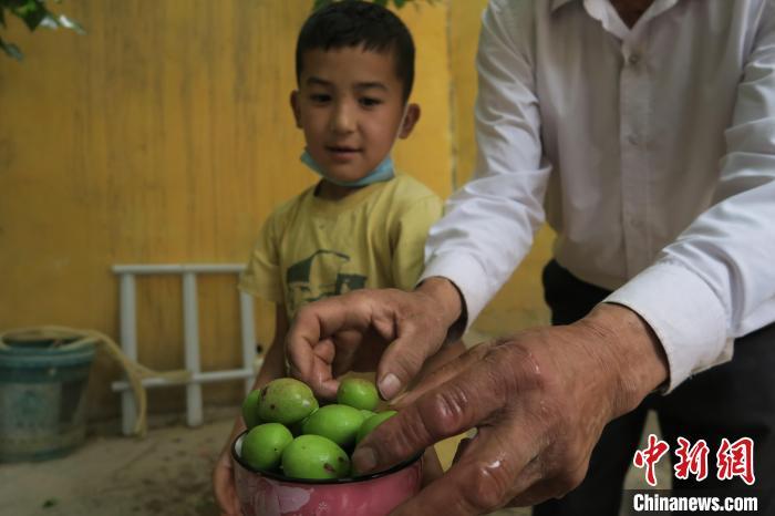 圖為進藏先遣英雄連誓師地原址所在的新疆維吾爾自治區(qū)和田地區(qū)于田縣普魯村現(xiàn)貌?！畛坛?攝