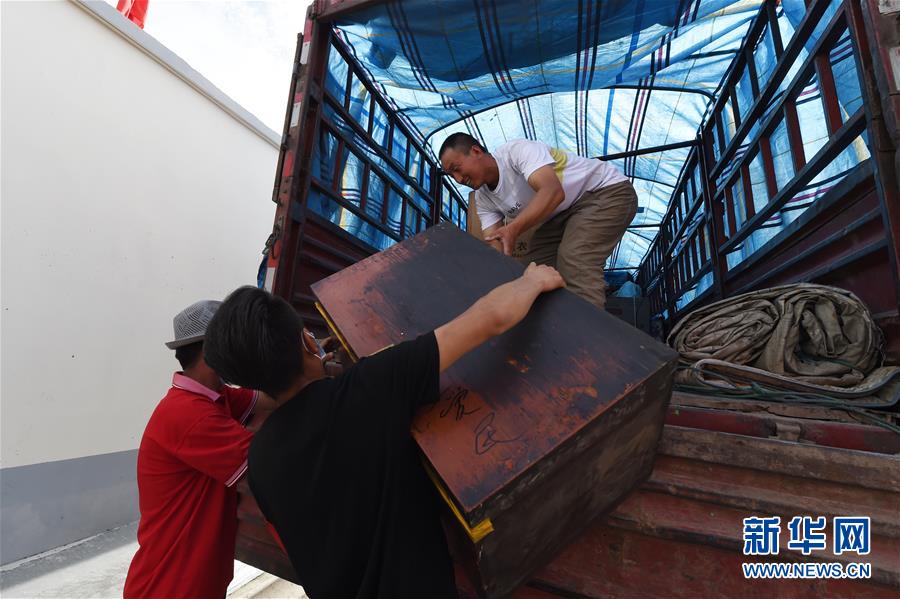 （新華全媒+）（26）千里“挪窩”，踏實開啟新生活