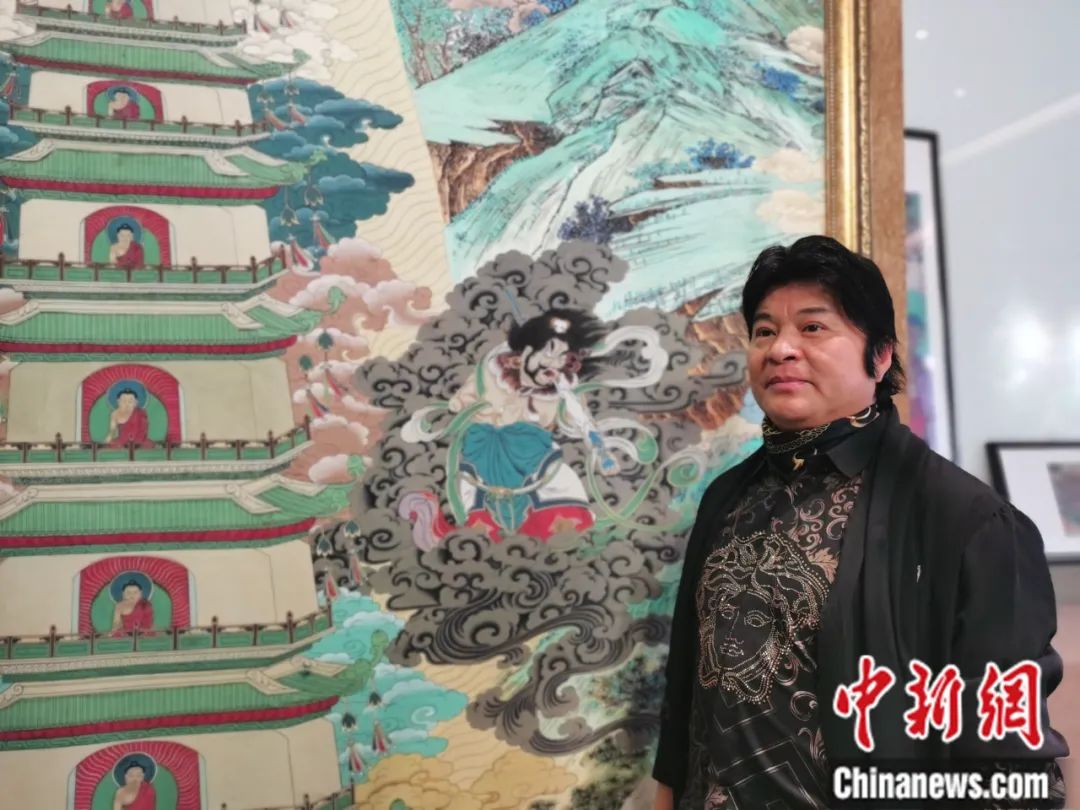 國家一級(jí)美術(shù)師劉觖。張?zhí)砀?攝